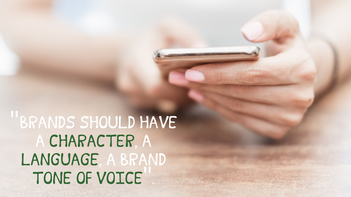 A phone being held in two hands, with a caption saying Brands should have a character, a language, a brand tone of voice